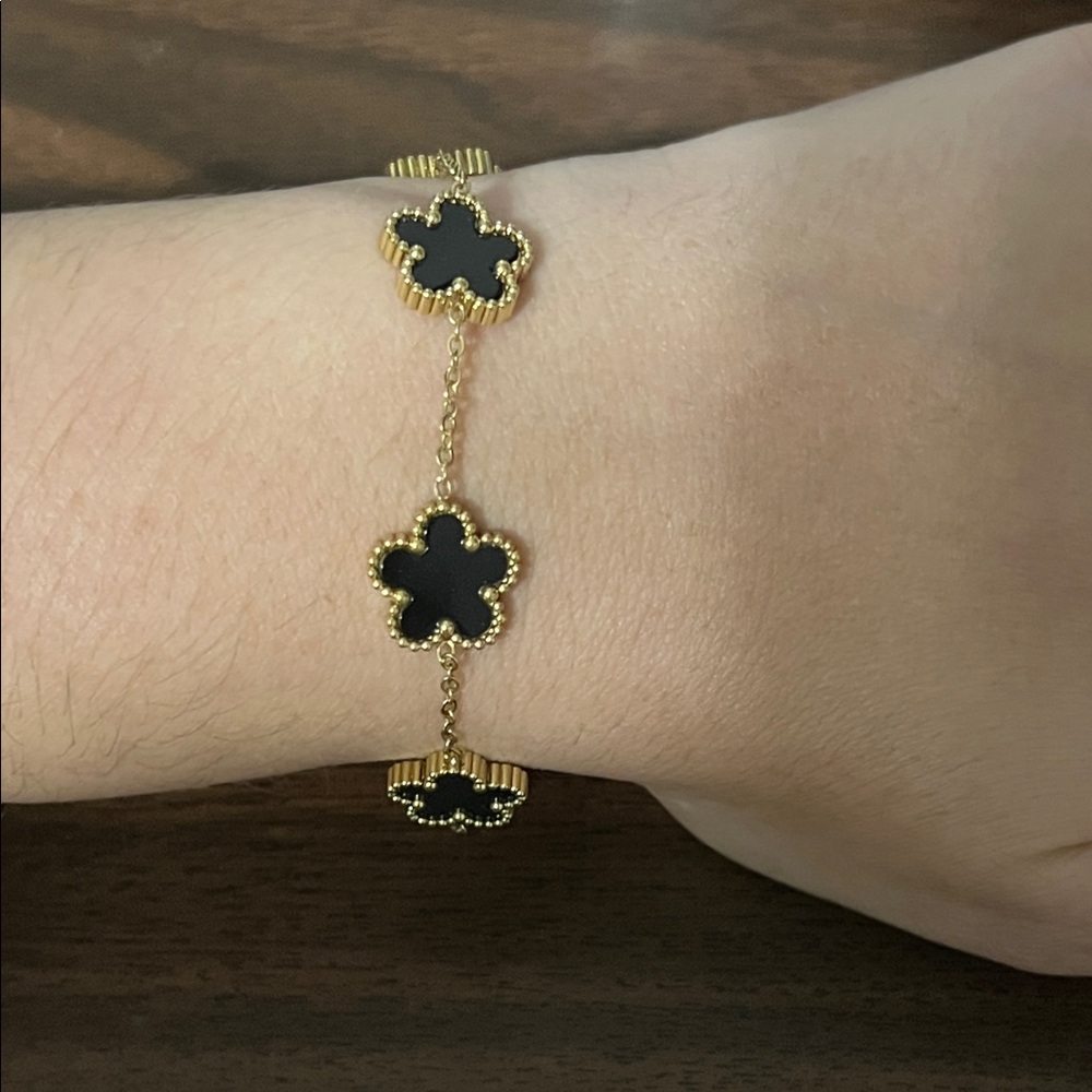 Gold plated stainless steel black flower bracelet